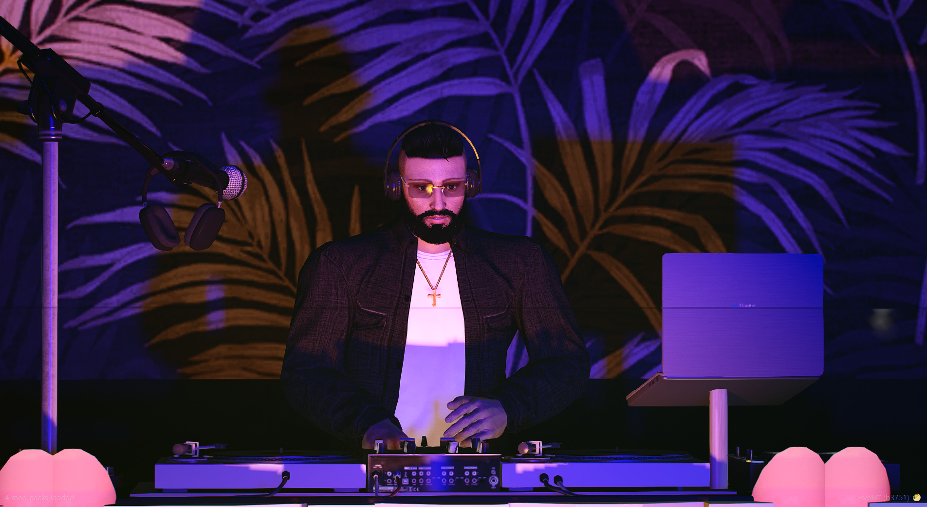 DJ Clip performing in a club booth